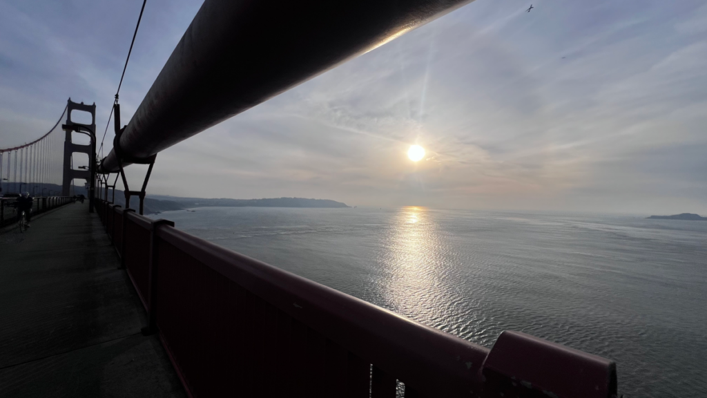 The sun just before sunset as seen from the west side of the Golden Gate Bridge.