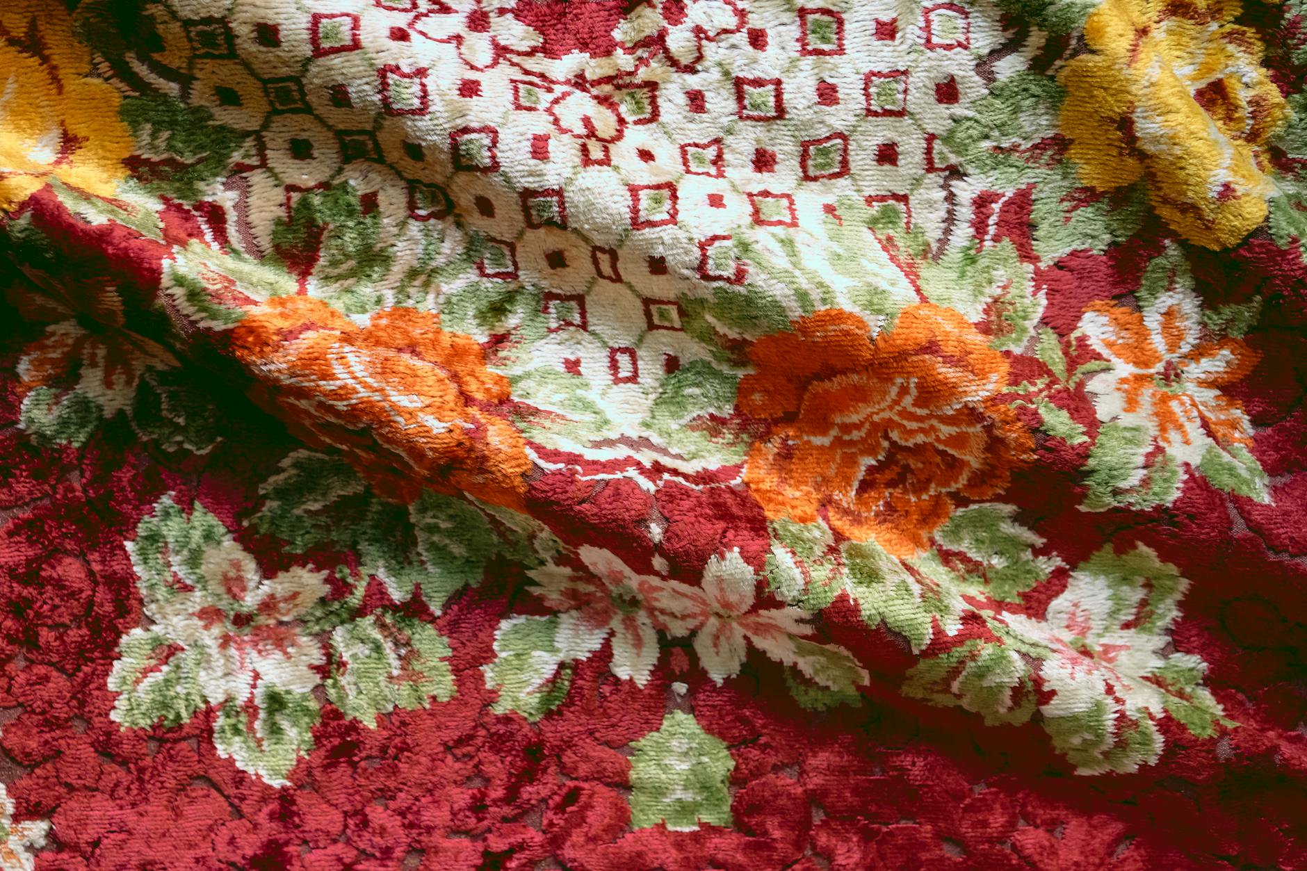 a red and orange floral patterned fabric