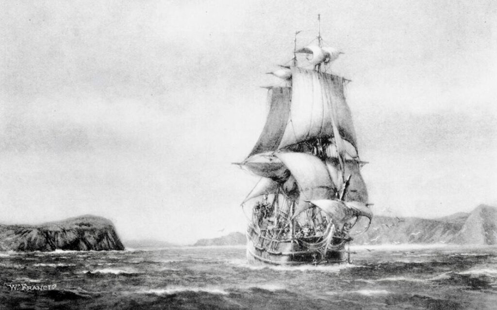 
Photograph of a drawing by Walter Francis depicting the ship San Carlos entering the bay of San Francisco on August 5, 1775, [s.d.]. The ship was the first ship to enter the bay and is at the center of the picture, its sails catching the wind as it cuts through the rough water of the bay, which is marked by whitecaps. There is a flock of seagulls to the right of the ship, above where the anchor is hanging. There is a land mass jutting out into the water on the left side of the picture and more land in the background behind the ship. Photoprint reads: "Drawn for 'The Beginnings of San Francisco'".