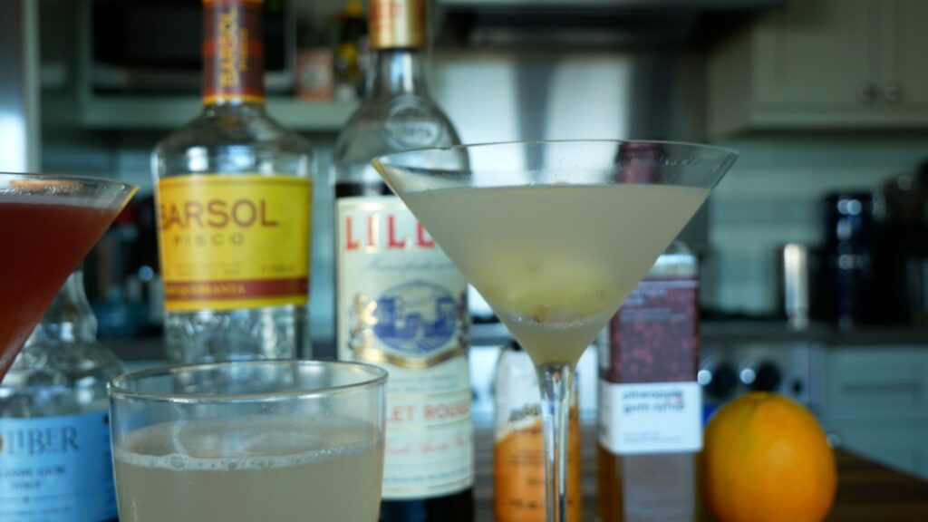 A yellowish cocktail.