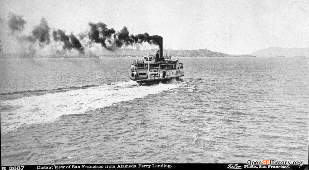 A steamer ferry on calm water.