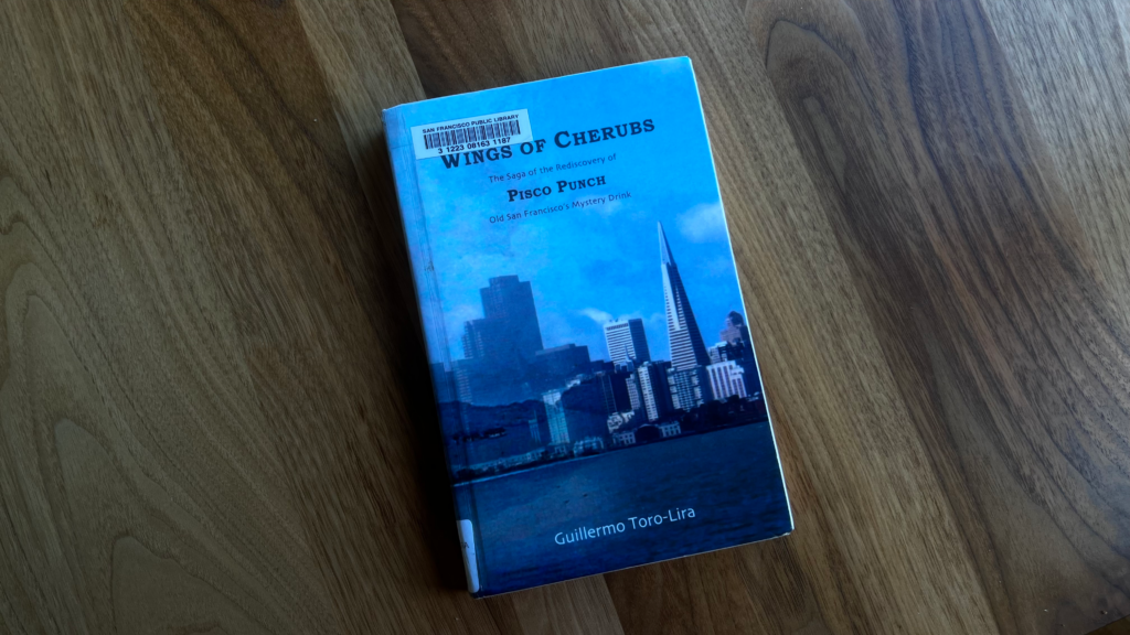 Cover art of a book titled "Wings of Cherubs" by Guillermo Toro-Lira. The cover art overlays a classic photo of San Francisco against a modern skyline.